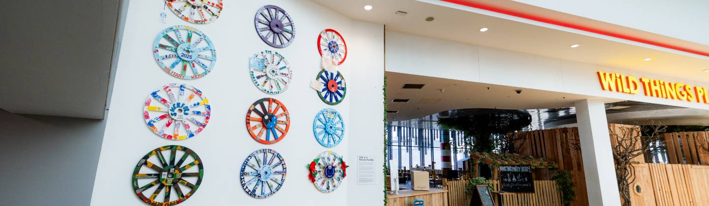 exhibition on the walls of decorated wheels