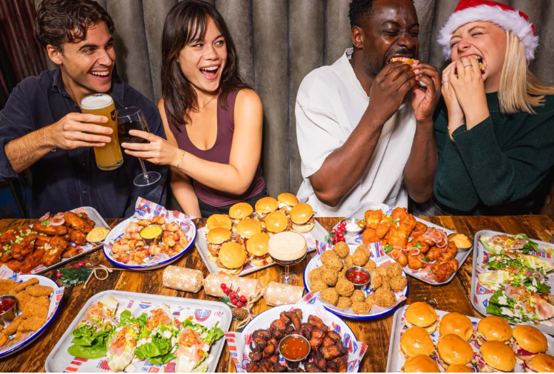 A group of people eating at brewdog