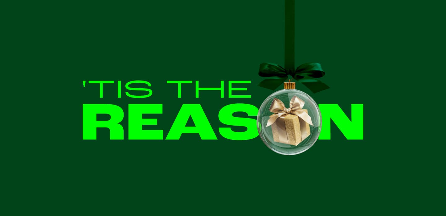 Tis the reason on green background with bauble