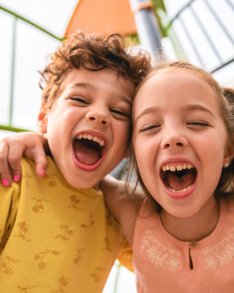 Kids having fun screaming at camera