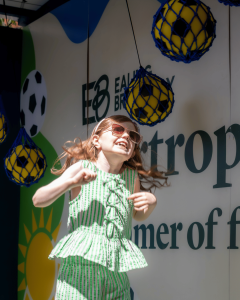 Child heading football on Jump Serve