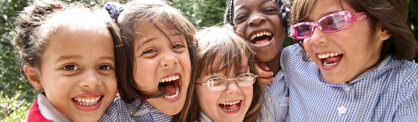 A group of school friends laughing together