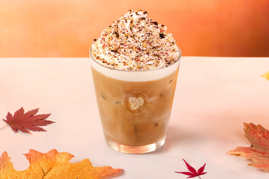 A maple hazel latte in a glass.