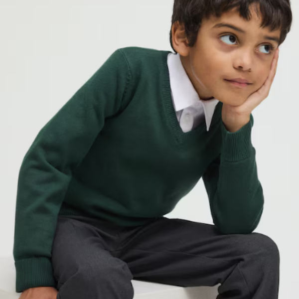 A child wear green school uniform.