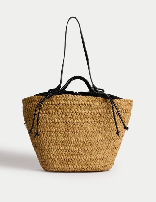 Straw bag with black handles