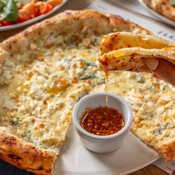 Franco manca pizza with honey dip